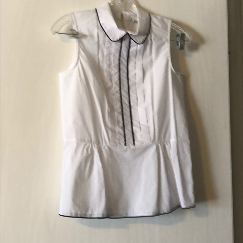 Peplum sleeveless top with cute collar detail